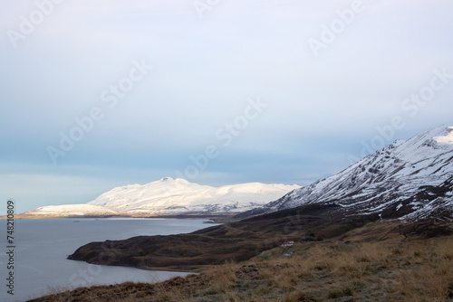 Fjord and moutains with snow, Iceland © yassmin