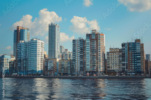  A photo of the office city at daytime on the opposite shore of the middle view © Kitta