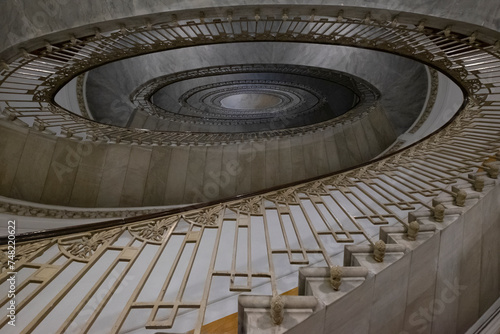 Monumental staircase of the Mannajuolo palace interior designed by Giulio Ulisse, Naples, Italy