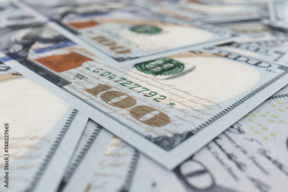 Fototapeta premium A hunderd new dollars 3d illustration. Cash of hundred dollar bills. A pile of one hundred US banknotes with president portraits.