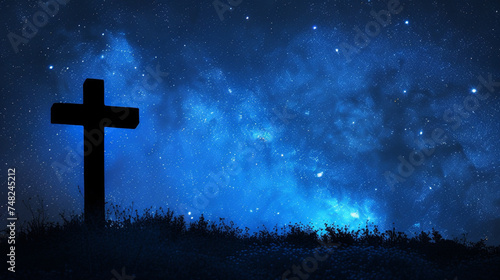 A silhouette of a cross against a starry night sky, evoking a sense of wonder and the eternal © DLC Studio