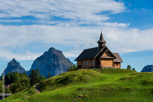View of an old wooden church in the Swiss mountains on Lake Lucerne.