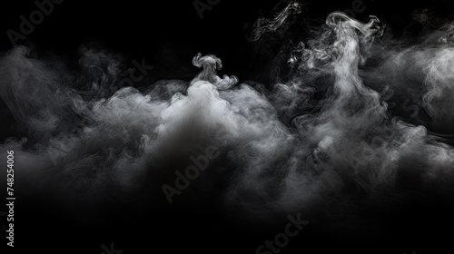 White smoke on a black background. Can be used as a background for various purposes.
