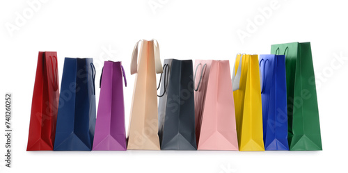 Colorful paper shopping bags isolated on white