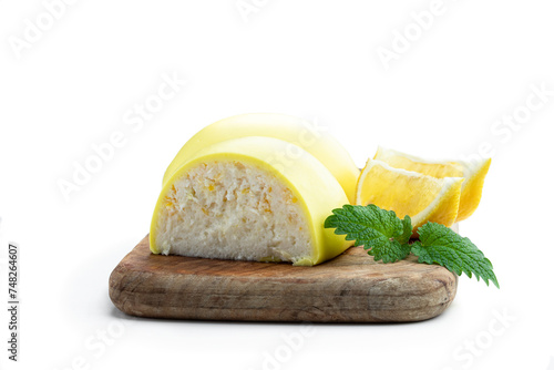 Homemade lemon cookies stuffed with whipped cream and lemon zest isolated on white background © lena_zajchikova