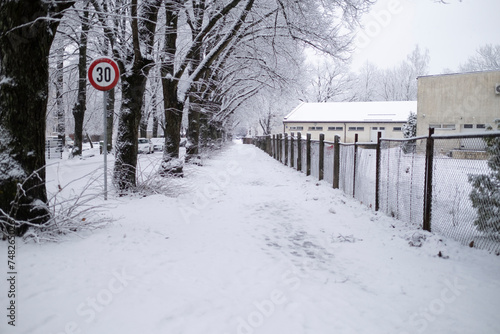 winter landscape, metal fence, snow road, limit sign, road sign, speed limit.