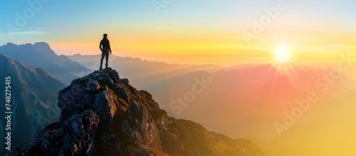 man on the top of a mountain. sunset sunrise view © gacor