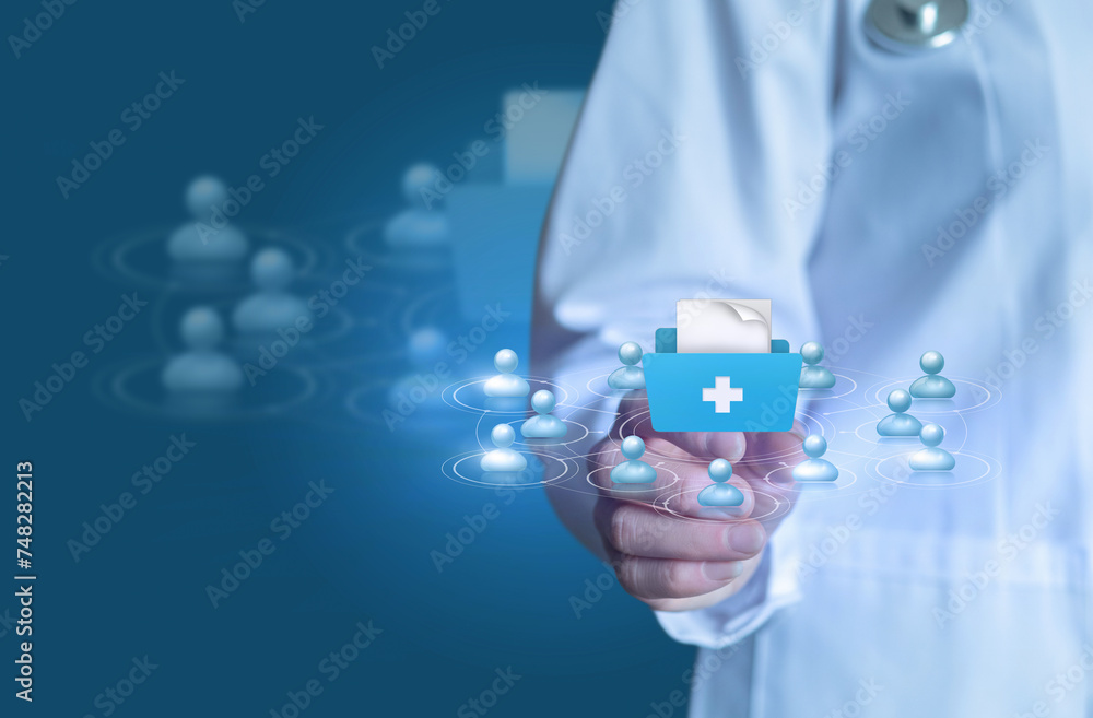 Doctor shows the system for electronic processing of patient data. Doctor shows the system for electronic processing of patient data.