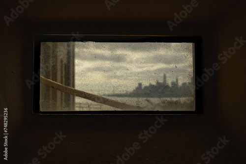 the view of san fransisco from a window of Alcatraz photo