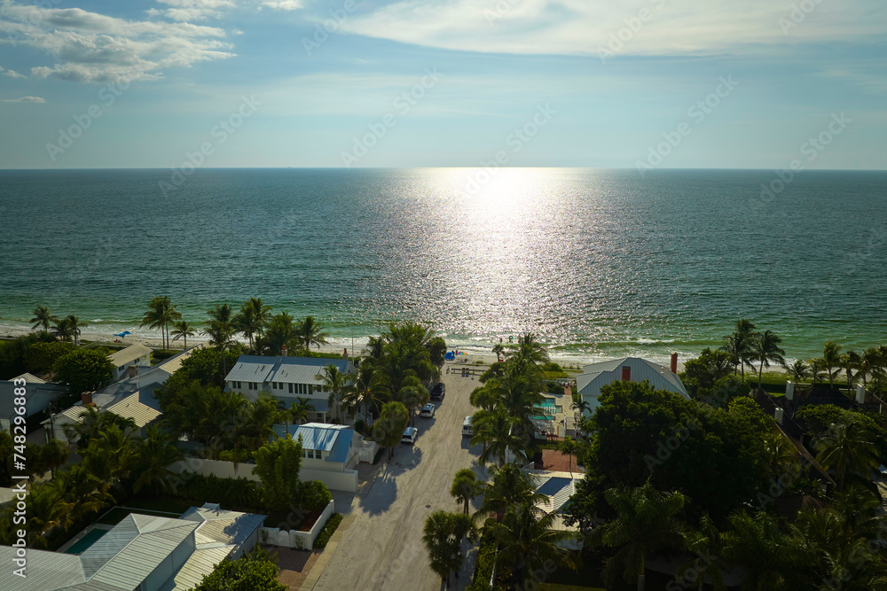 American waterfront houses in rural US suburbs. View from above of large residential homes in island small town Boca Grande on Gasparilla Island in southwest Florida
