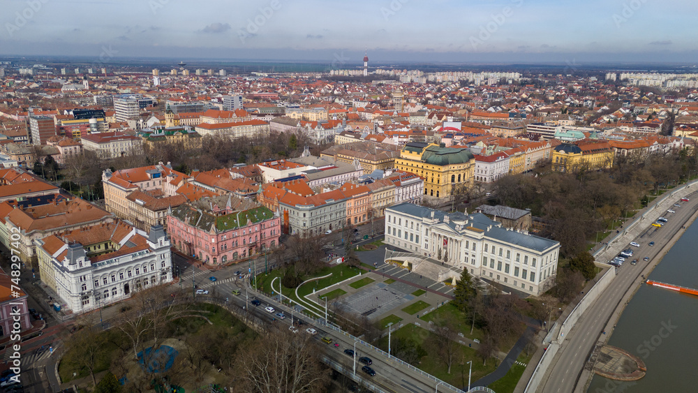 Drone footage from downtown of Szeged, Hungary on a sunny winter day.
Szeged, Drone, Aerial, Hungary, Urban Landscape, Szeged Cathedral, Tisza River, Bridge