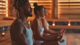 Individuals practicing meditation in a tranquil sauna environment, bathed in warm, calming light to enhance relaxation and mindfulness
