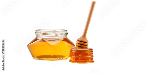pure and yummy honey fill in a jar with hiney dipper 
