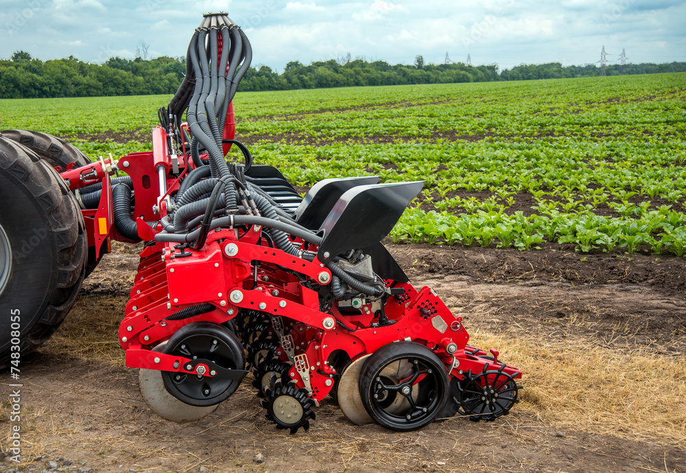 Obraz premium Agricultural machinery - trailed seeder, equipment for simultaneous application of fertilizers