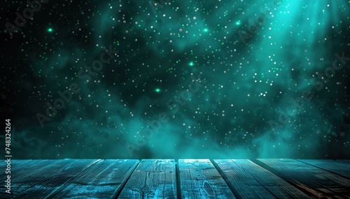 wooden table on a glittering background from green lights