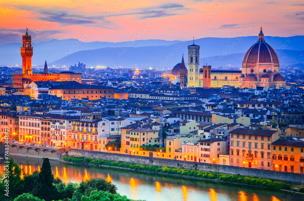 Tuscany, Italy - Florence skyline with Arno River and Palazzo Vecchio.