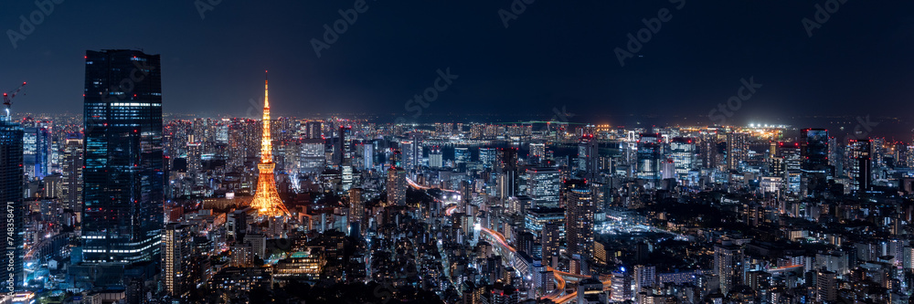 Tokyo central area city view with Azabudai Hills and Tokyo Tower at night. - obrazy, fototapety, plakaty 
