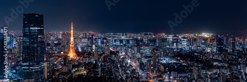 Tokyo central area city view with Azabudai Hills and Tokyo Tower at night. photo