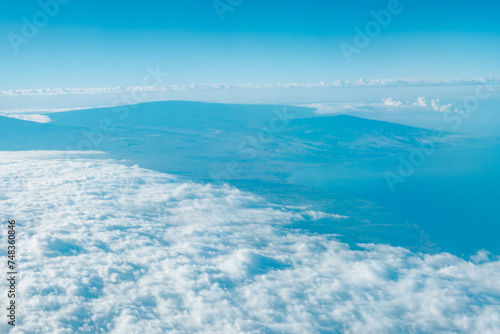 Aerial photography of Honolulu to Hilo from the plane.  From left to right: Mauna Kea, Mauna Loa, and Hualalai. Hawaii island
 photo