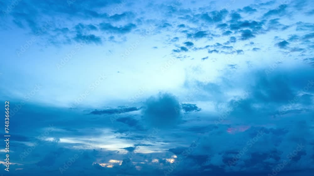 Aerial hyper lapse view amazing cloud moving in blue sky at blue sunrise above the ocean..scenery stunning sky colorful cloud over the islands in Rawai sea Phuket Thailand..Sky texture. Aerial hyper lapse view amazing cloud moving in blue sky at blue sunrise above the ocean..scenery stunning sky colorful cloud over the islands in Rawai sea Phuket Thailand..Sky texture.
