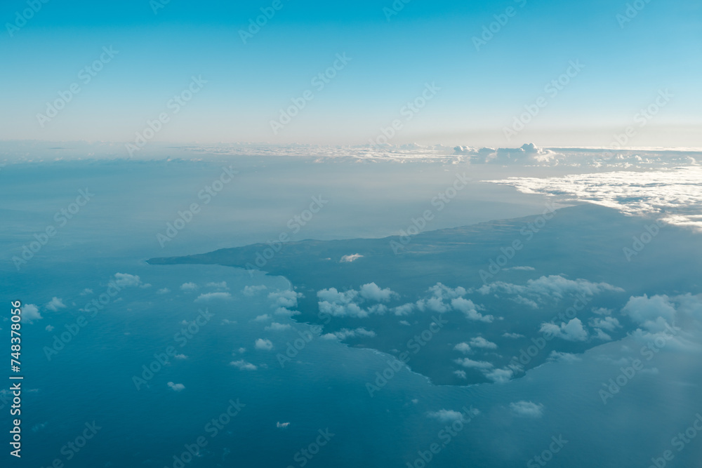 Aerial photography of Honolulu to Kahului from the plane.  Molokai is the fifth most populated of the eight major islands that make up the Hawaiian Islands archipelago in the middle of the Pacific 