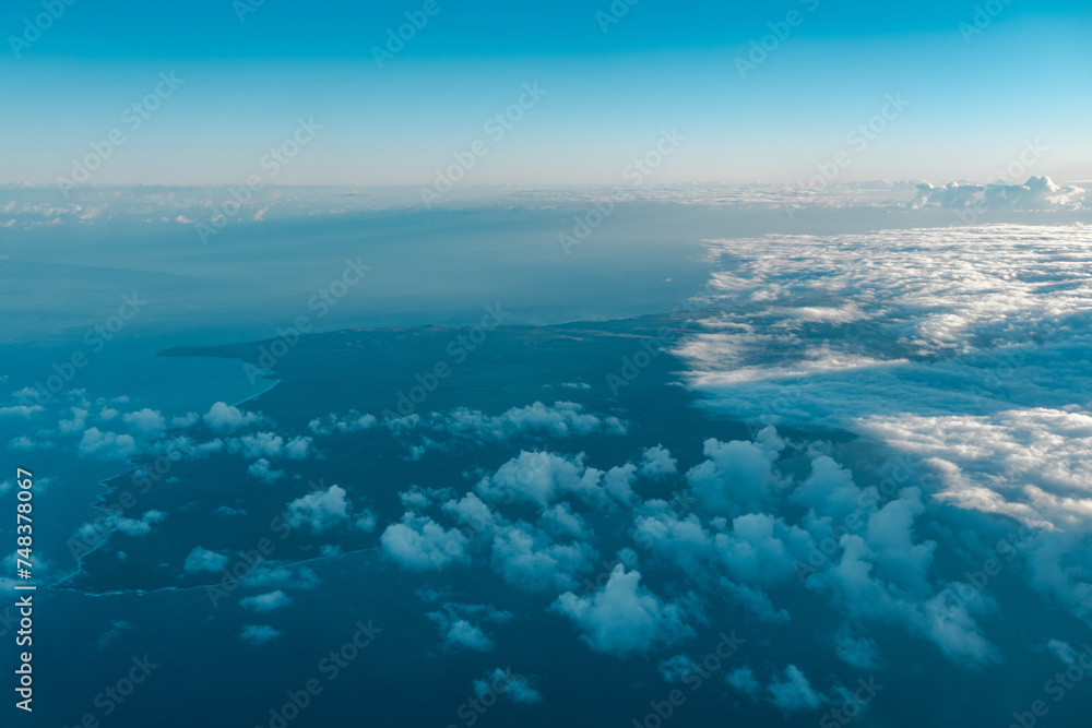 Aerial photography of Honolulu to Kahului from the plane.  Molokai is the fifth most populated of the eight major islands that make up the Hawaiian Islands archipelago in the middle of the Pacific 