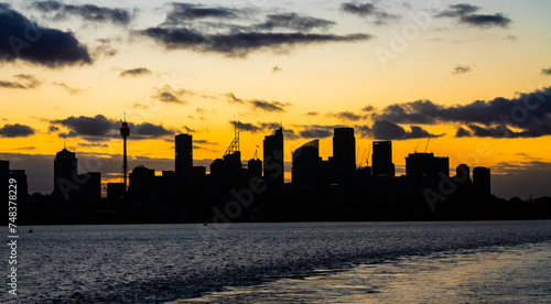 Silhouette of sydney at yellow sunset.