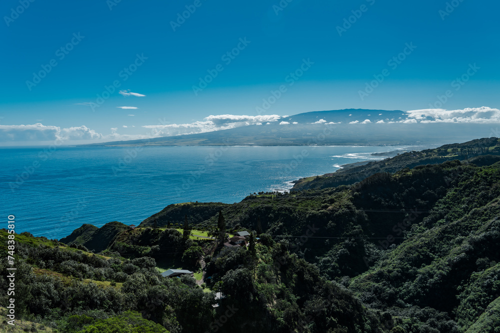 Kahekili Hwy, Wailuku, Maui Hawaii.  Kahului with Haleakalā or the East Maui Volcano.