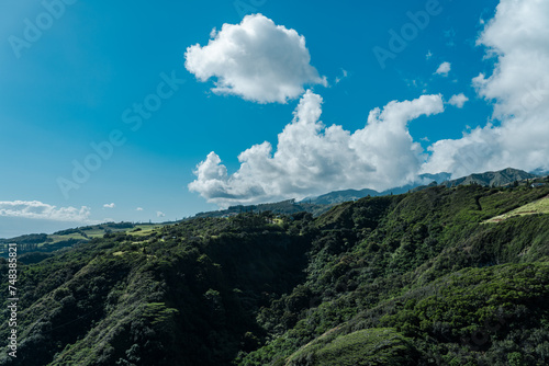 Kahekili Hwy, Wailuku, Maui Hawaii.   The West Maui Mountains, West Maui Volcano, or Mauna Kahālāwai which means "holding house of water, is approximately 1.7 million years old and forms a much eroded © youli zhao