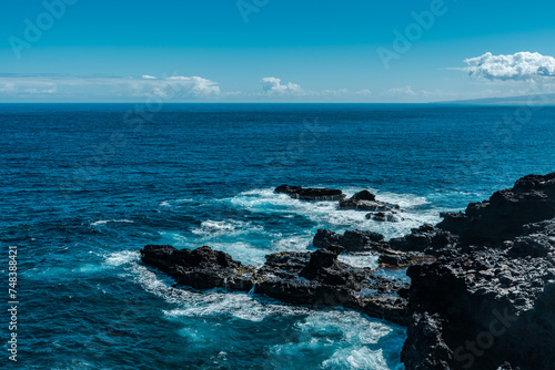 Waves Crashing Against Basalt Rocks. Kahekili Hwy, Wailuku, Maui Hawaii. Olivine Pools trail. reef