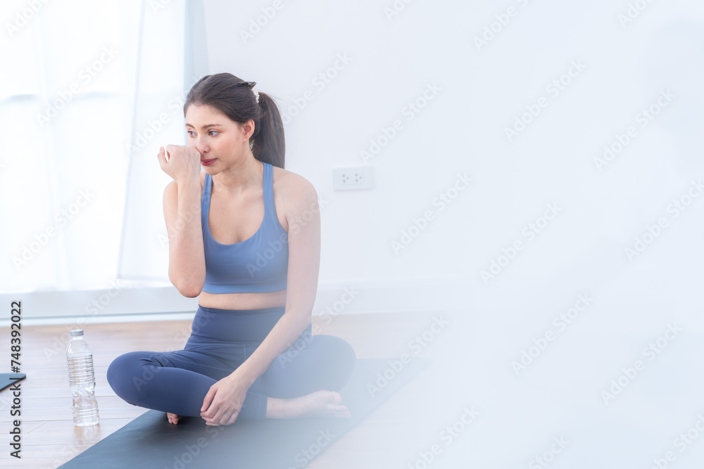 Two women confident training yoga. Athletic women in sportswear doing fitness stretching exercises at home in the living room. Sport and recreation concept. Yoga teacher is helping young woman. Two women confident training yoga. Athletic women in sportswear doing fitness stretching exercises at home in the living room. Sport and recreation concept. Yoga teacher is helping young woman.