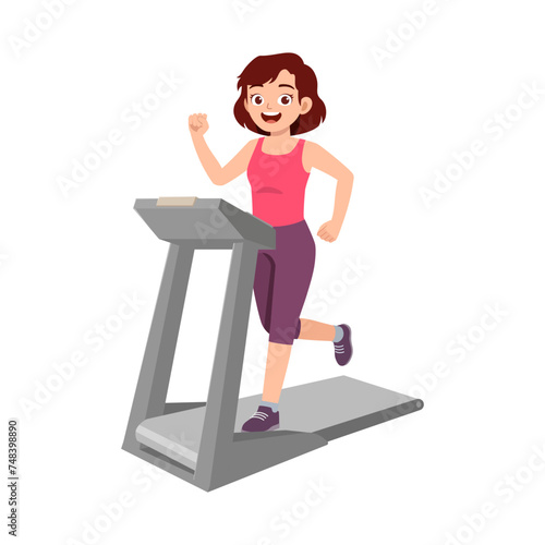 happy young sporty woman running on treadmill