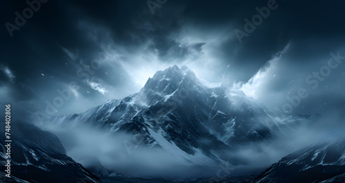 a mountain in the middle of some dark clouds