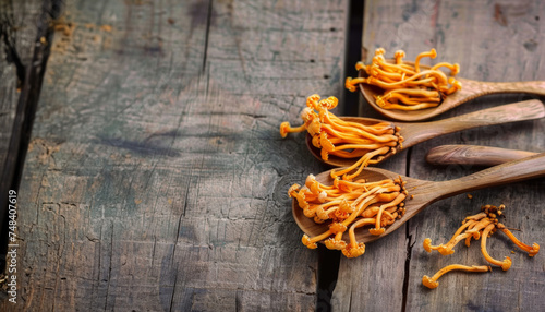 Golden Cordyceps Mushrooms on Wooden Spoons. Generative AI.