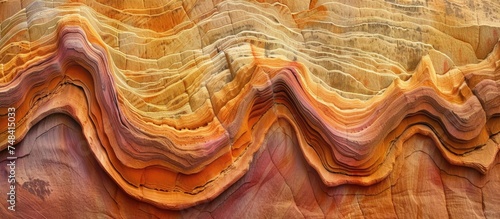 A close-up view of a distinctive rock formation, shaped by erosion over time in Zion Canyon at Zion National Park, Utah. The rugged texture of the rock contrasts against the vast expanse of the clear