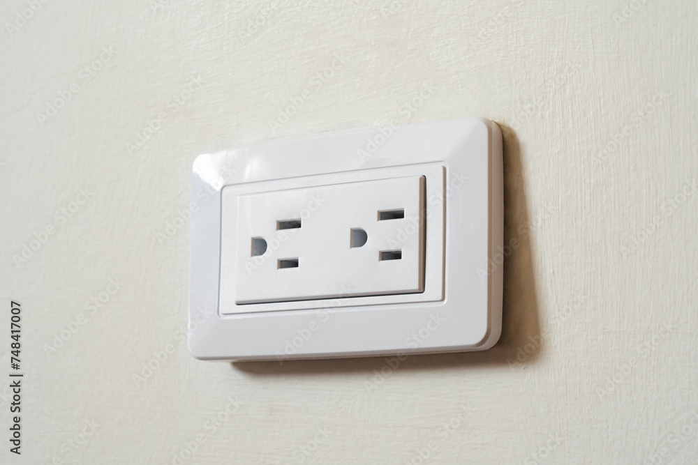 Two stall white wall outlet with no connected devices, energy and connection theme, horizontal photo Two stall white wall outlet with no connected devices, energy and connection theme, horizontal photo