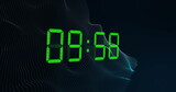 Image of green digital clock timer changing on black background