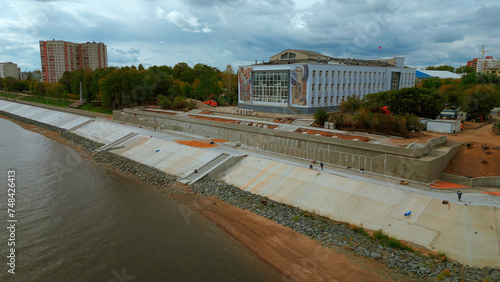 Obraz na plátně Aerial view of city embankment with construction site