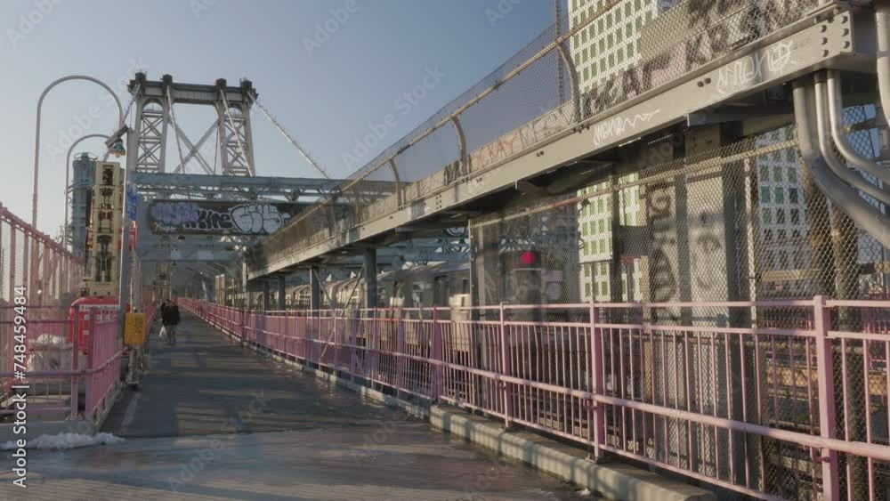 Handheld shot of the train crossing The Williamsburg Bridge Handheld shot of the train crossing The Williamsburg Bridge