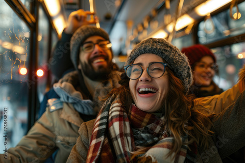 Cheerful couple having fun while riding in a public bus
