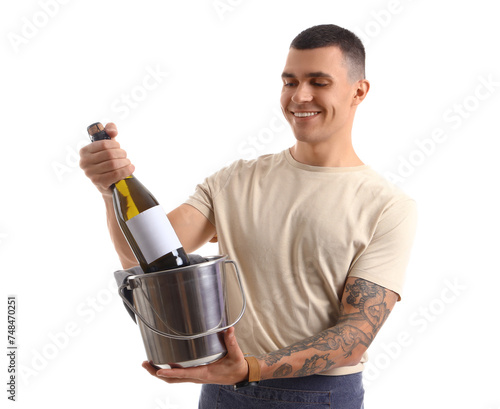 Young male bartender with b...