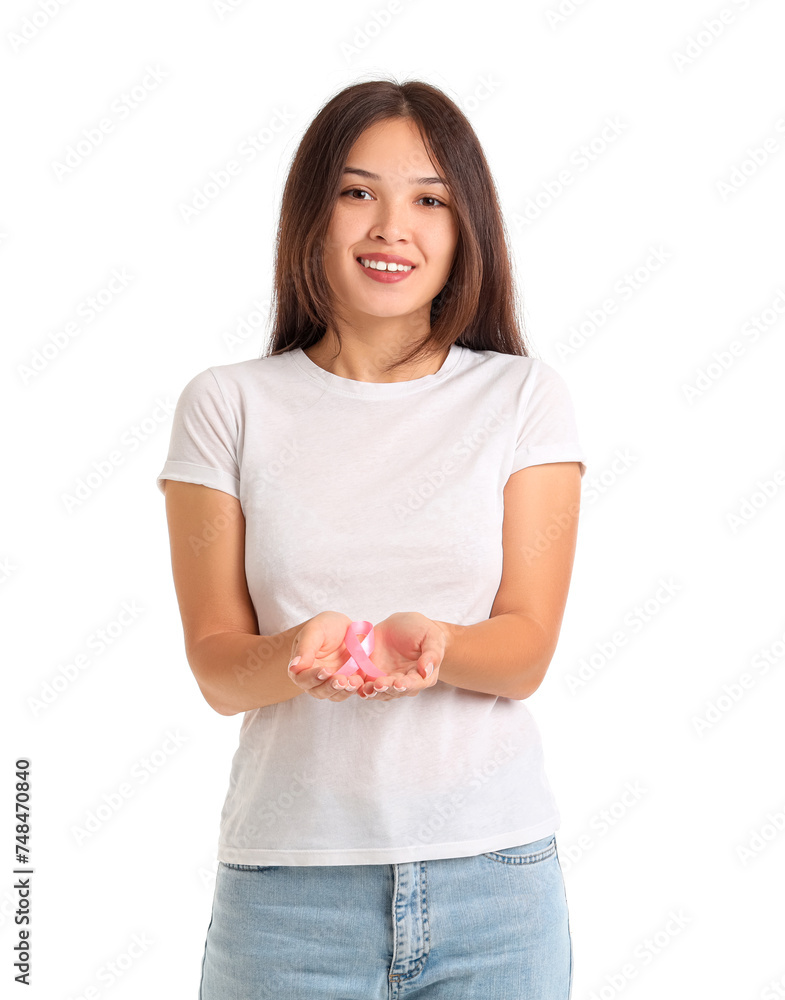 Young Asian woman with pink ribbon on white background. Breast cancer awareness concept Young Asian woman with pink ribbon on white background. Breast cancer awareness concept