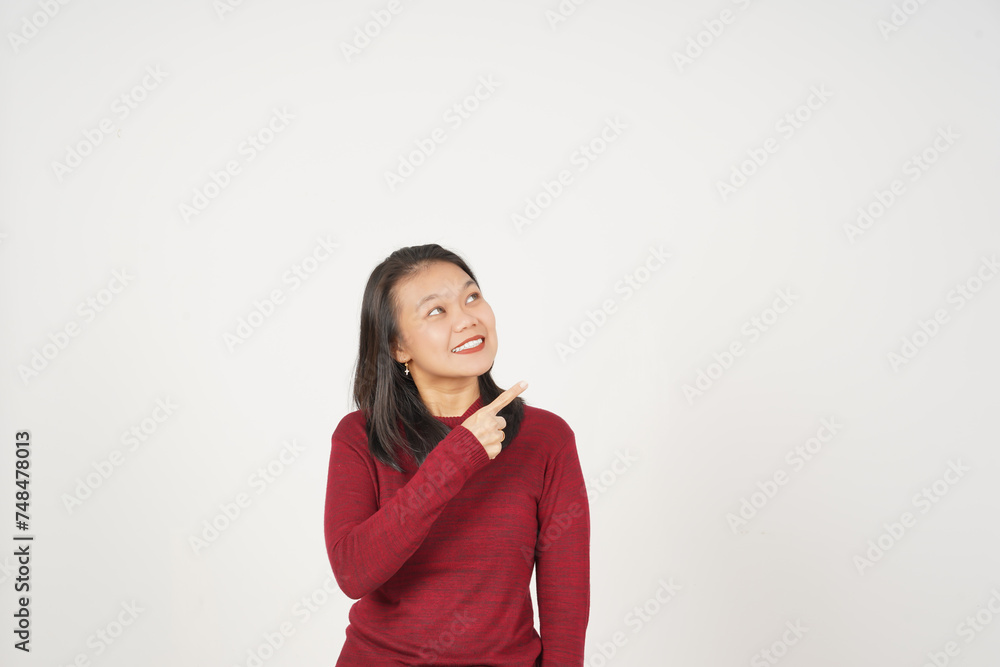 Young Asian woman in Red t-shirt pointing side copy space isolated on white background Young Asian woman in Red t-shirt pointing side copy space isolated on white background
