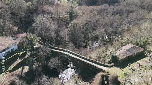 Roman bridge along Antonino's Via Nova the esteemed Navea Bridge, aerial overview photo