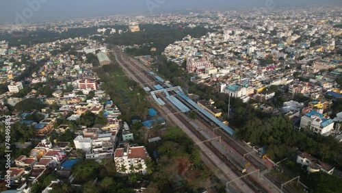 Aerial video of Pondycherry railway station and the entire city shows railway tracks and residential area. photo