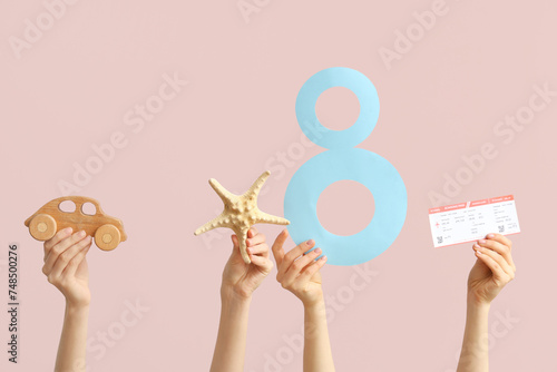 Female hands with paper fig...