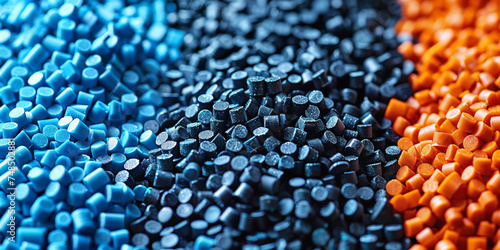 3d blue black tiny plastic cylindrical grains , blue plastic polymer pellets,polymer for pipes, Plastic and polymer industry,blue PVC granulate.Microplastic products. photo