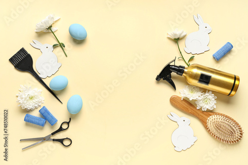 Composition with hairdresser's supplies, Easter eggs and decor on color background