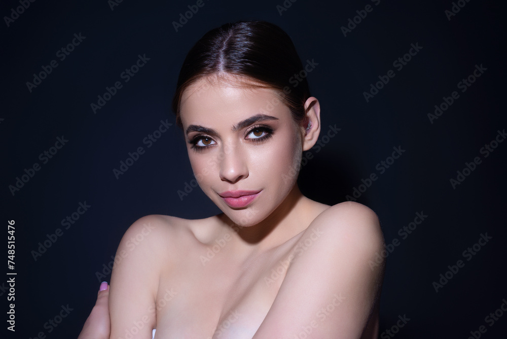 Sensual woman with beautiful face and smooth skin, bare shoulder. Sexy model with natural makeup and beauty eyes on isolated studio background. Beautiful sexy model girl with naked shoulder. Sensual woman with beautiful face and smooth skin, bare shoulder. Sexy model with natural makeup and beauty eyes on isolated studio background. Beautiful sexy model girl with naked shoulder.