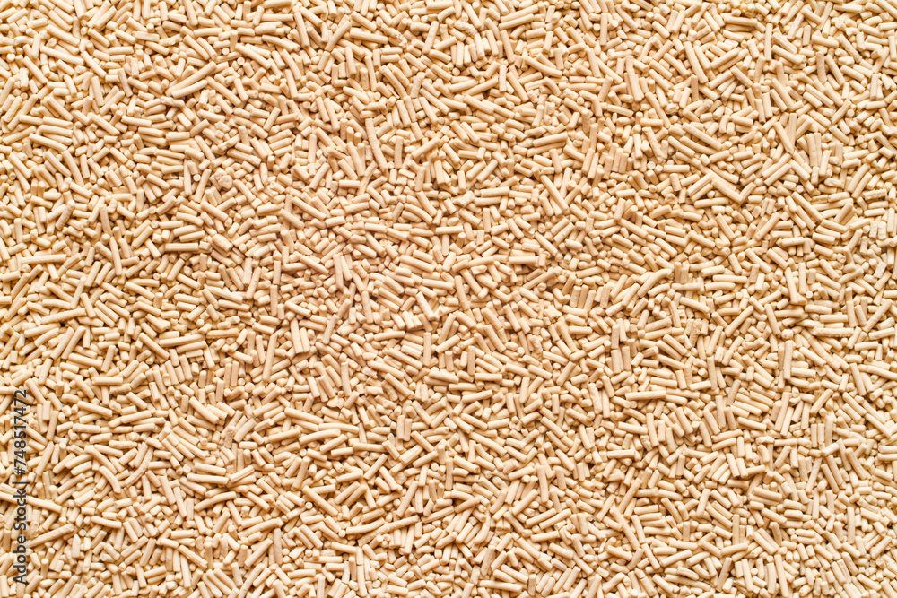 Dry granulated yeast. The texture of yeast. Natural baking ingredient. Dry granulated yeast. The texture of yeast. Natural baking ingredient.